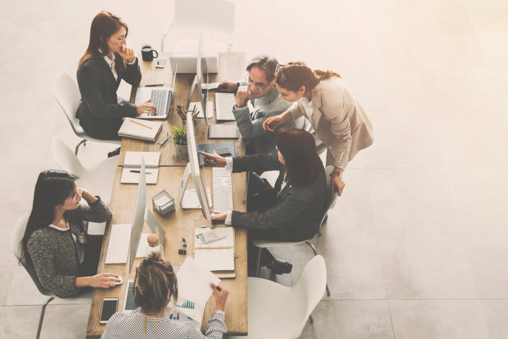 people working around a table